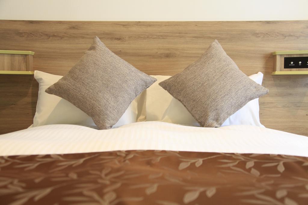 Hotel Sunshine Ucunomija Szoba fotó